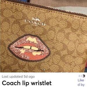 Coach Tan Wristlet with Lip Design